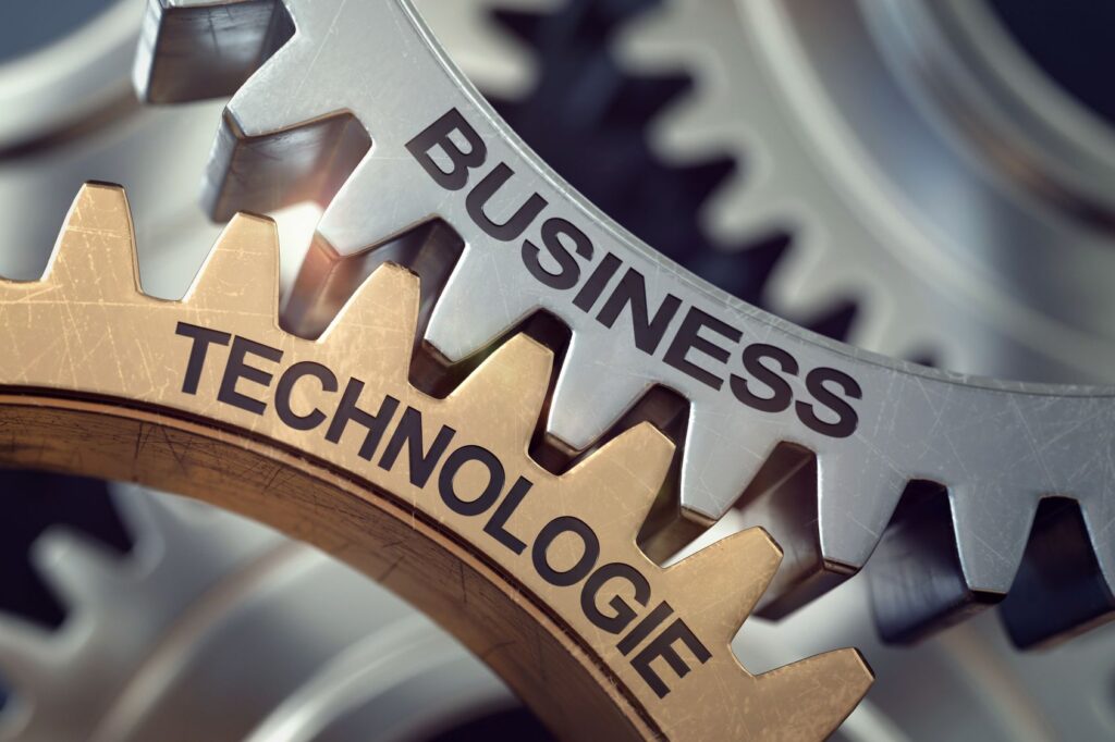 Gears labelled business and technology interlocking